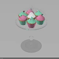 Colorful Pink And Green Cupcakes On Transparent Stand With Glass Dome