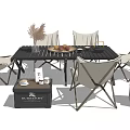 Outdoor Dining Table With Foldable Beige Chairs Fruit Platter And Decorative Crates