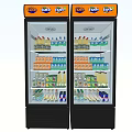 Two Upright Beverage Coolers With Fanta Sprite Logos Filled With Bottled Drinks