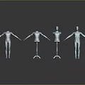 White Mannequins With Blue Suit For Clothing Display On Black Floor