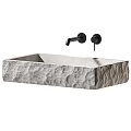 Natural Stone Textured Washbasin With Black Faucets And Above Counter Design