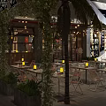 Charcoal Fire Restaurant With Barbecue Lobster Drinks Outdoor Seating Lanterns String Lights