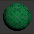 Green Sphere With Intricate Floral And Swirl Patterns On Surface