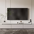 Modern White TV Stand With Drawers Wall Mounted TV Decorative Items And Green Plant