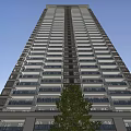 Modern High Rise Residential Building Exterior Design With Glass Windows And Balconies