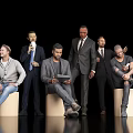 Group of People in Different Clothing Sitting Standing Using Tablet Talking and Drinking