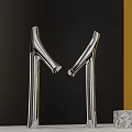 Silver Double Faucets Against Black And Yellow Background With Marble Decorative Objects 3d model