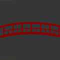 Japanese Style Red Arch Bridge With Red Railings And Light Colored Deck