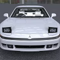 White Mitsubishi Sports Car With Pop Up Headlights On Road