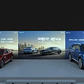 Modern Auto Show Booth Featuring Large Screen Display Cars Seats And Attendees