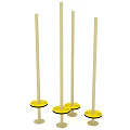 Playground Equipment With Five Light Colored Tall Poles Yellow Circular Bases And Black Edges
