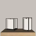 Two Modern Table Lamps With Square Metal Frame And White Fabric Shade Illuminated On Table