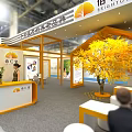 Modern Exhibition Booth Design With Yellow White Decor Display Screen Tree And Visitor Interaction 3d model