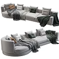 Cozy Multi Seater Sofa With Soft Gray Blankets And Beige Green Cushions