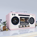 Pink Radio Displaying Lively Commercial Street With Decorative Plants And Ornaments