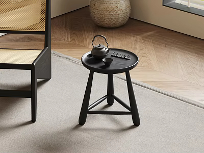 Minimalist Black Round Side Table with Teapot Tray Near Wicker Chair on Herringbone Floor 3d model