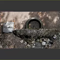 Ancient Stone Arch Structure With Green Water Moss Stones And Rough Wall