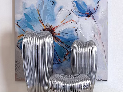 Three Silver Ribbed Vases Displayed With Blue Floral Painting On White Background 3d model