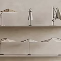Different Styles of Sunshades Open and Folded Displayed on Shelves in Beige Light Brown