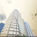 Tall Modern Office Building With Curved Glass Facade And Blue Sky Surroundings
