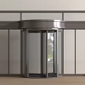 Modern Revolving Door Entrance With Glass Panels And Stainless Steel Frame