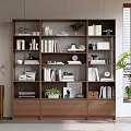 Modern Wooden Bookshelf With Multiple Shelves Drawers Books Decorative Items And Potted Plants