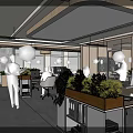 Modern Public Office Space Featuring Open Layout Green Plants Hanging Lights And Work Desks