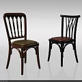 Two Stylish Dining Chairs With Brown Black Wooden Frames And Green Brown Seats