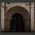 Classic Historical Arched Entrance Gate With Stone Brick Frame And Wooden Metal Door Design