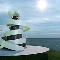 Spiral Black and White Striped Tower with White Spheres Overlooking the Sea on Sunny Day
