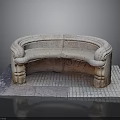 Classic Stone Curved Bench With Ornate Armrests On Brick Paved Surface