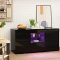 Modern Black Kitchen Sideboard With Fruit Bowl Green Plants And Purple Light Drawer