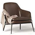 Modern Gray Armchair with Striped Pillow and Plaid Blanket on Black Metal Legs