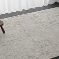 Square Rug With Light Beige Textured Pattern And Small Stools Near White Curtains