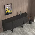 Modern Black Entryway Console Table With Drawers Against Wooden Wall Decorated With Vase And Artwork