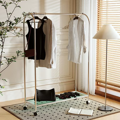 Metal Clothing Rack with Hanging Clothes Black Bag and Shoes on Tray Indoor 3d model
