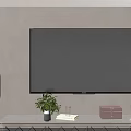 Elegant TV Stand With Diamond Pattern Gold Legs Green Plant And Decorative Items