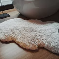 Soft Fluffy White Shaped Rug With Irregular Shape On Wooden Floor 3d model