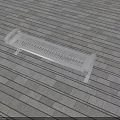 Metal Outdoor Bench With Perforated Design On Gray Stone Tile Floor