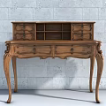 Vintage Wooden Desk With Carved Legs Drawers And Shelf Against Gray Brick Wall