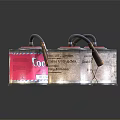 Vintage Metal Paint Thinner Cans With TATTOO Label And FULLM Brand On Shiny Black Surface