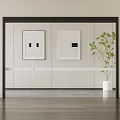 Minimalist Modern Interior With Glass Partition Framed Artworks And Green Potted Plant