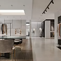Modern Clothing Store Interior Design With Fashion Clothes On Hangers And Chairs