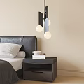 Modern Nightstand Beside Bed with Black Headboard Books Cup and Lamp with Two Globe Bulbs