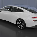 White Modern Electric Car With Sleek Aerodynamic Body And Green License Plate