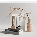 Modern Vase With Speckled Texture Holding Slender Beige Blossom Branches On Books