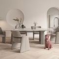 Modern Dining Table Set With Gray Chairs And Decorations On Light Colored Wooden Floor
