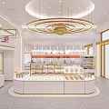 Elegant Dessert Shop Interior With Circular Pastry Display Counter Golden Chandeliers And White Shelves