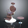 Vintage Brown Leather Barber Chair With Metal Frame And Small Table Holding Barber Tools