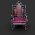 Vintage Wooden Armchair With Intricate Carvings And Pink Cushion Accent